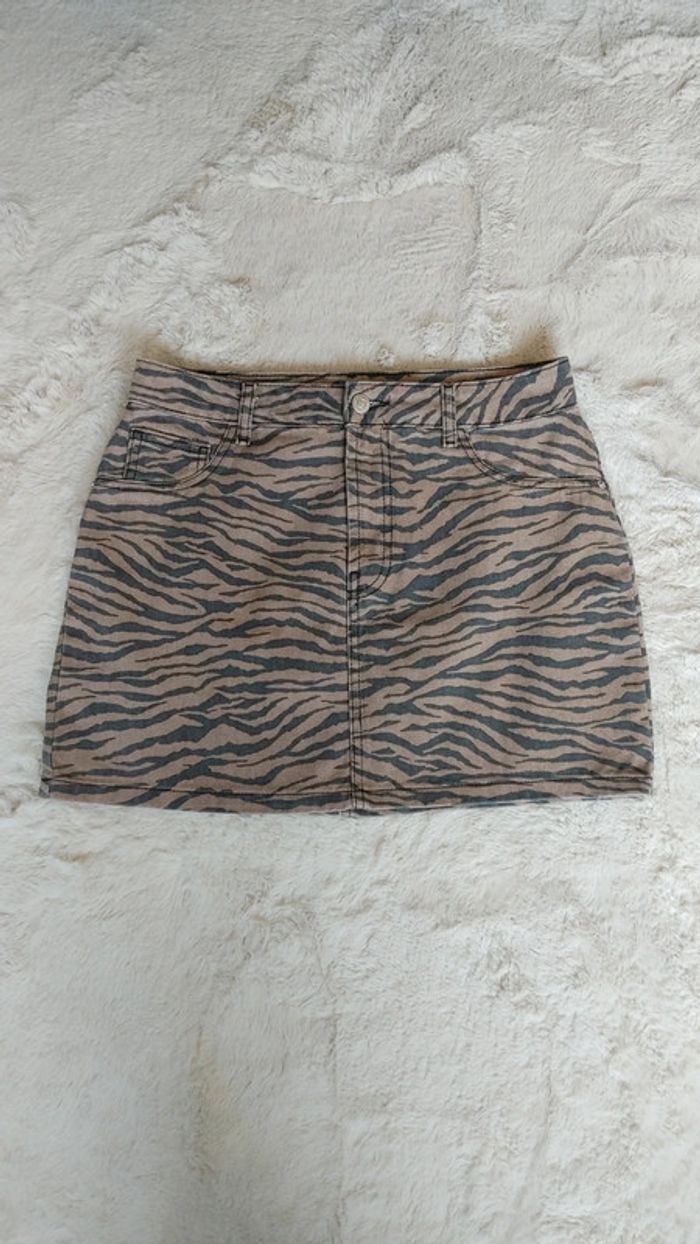 Mini jupe en jean motif zébré zèbre en très bon état