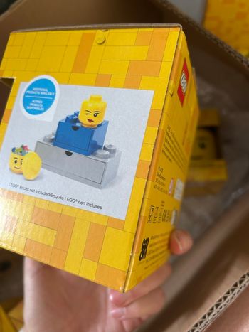 Mini tête de rangement. Lego.