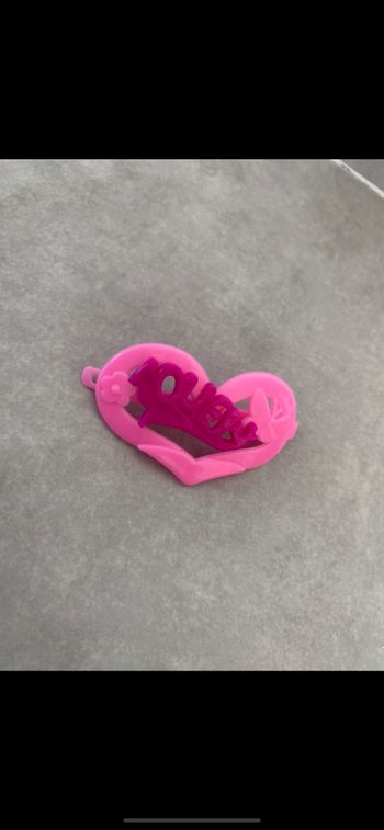 Jouet pince poupée
