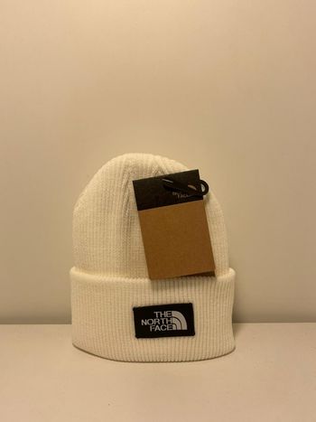 Bonnet blanc THE NORTH FACE – Taille unique – 100% acrylique – Style affirmé – Parfait hiver urbain