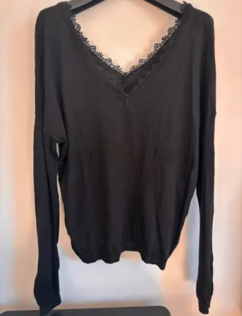 Pull fin noir col V