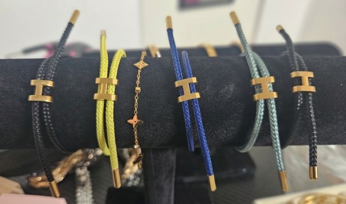 Bracelets H neufs