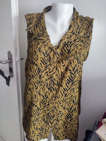 #kytie40femme. Chemise sans manche taille 40/42