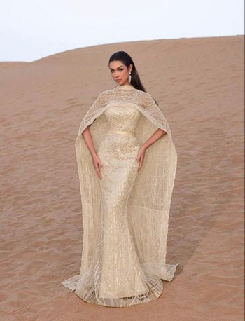 Robe de soirée luxueuse avec cape perle et stras