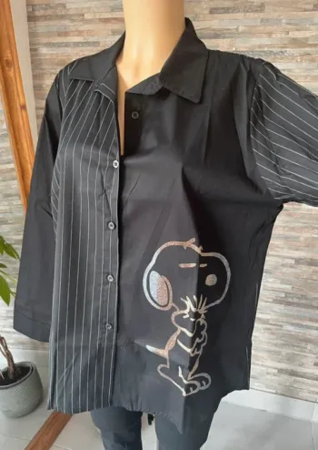 Chemise noire et snoopy pailleté