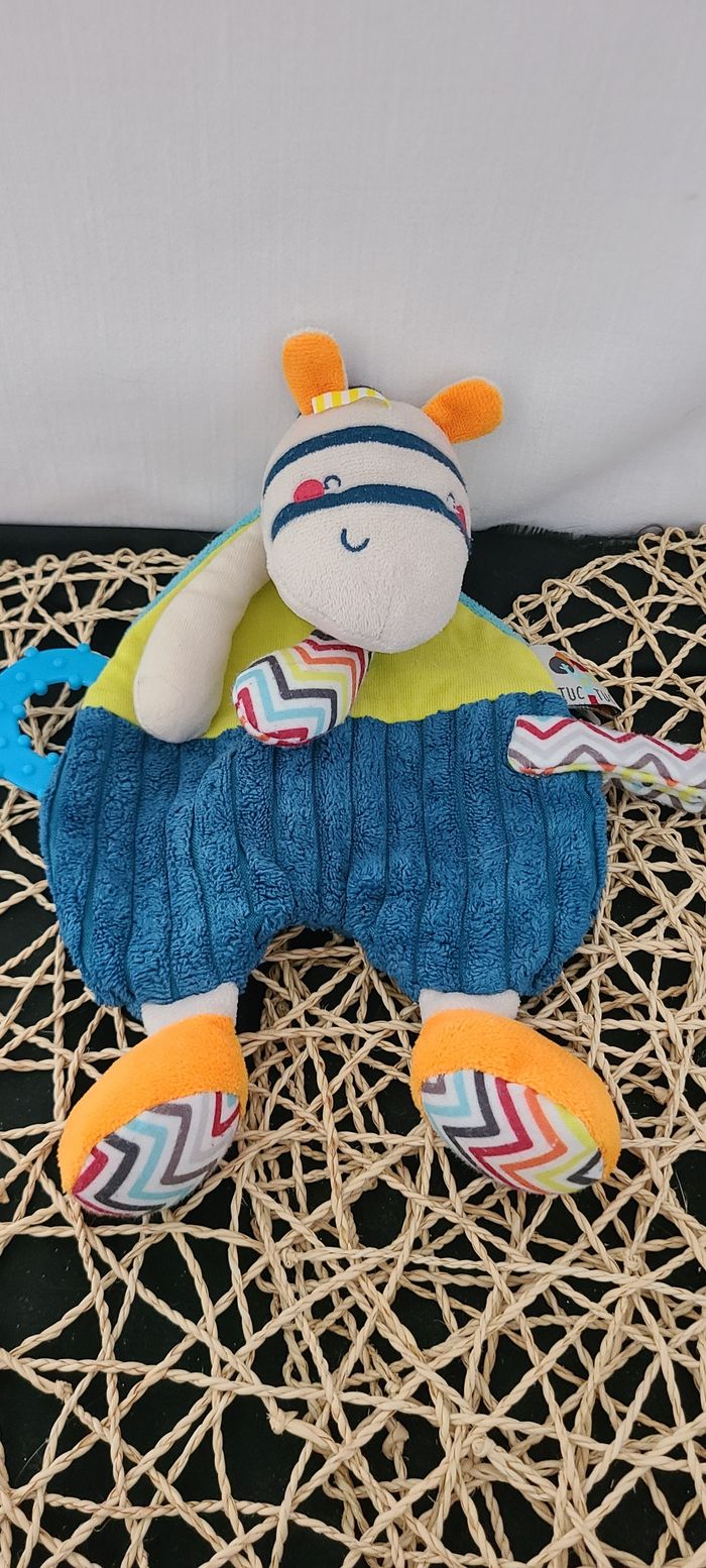Doudou plat zebre bleu vert orange TUC TUC