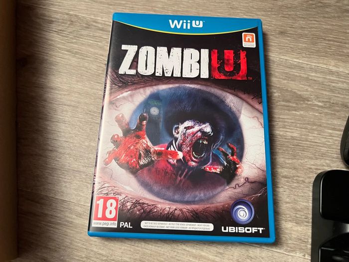 Console Wii U pack collector Zombi U en boite excellent état - photo numéro 18
