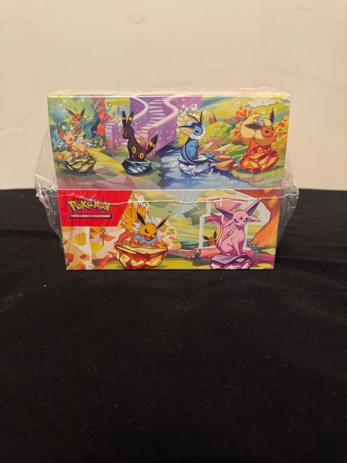 Display Mini tins sceller Évolutions prismatiques EV8.5