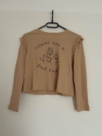 Haut beige dessin fleuri