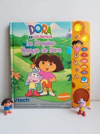 Livre interactif Le premier voyage de Dora l'exploratrice et figurines