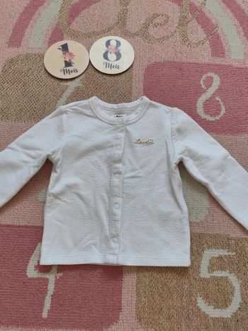 Gilet blanc écriture dorée