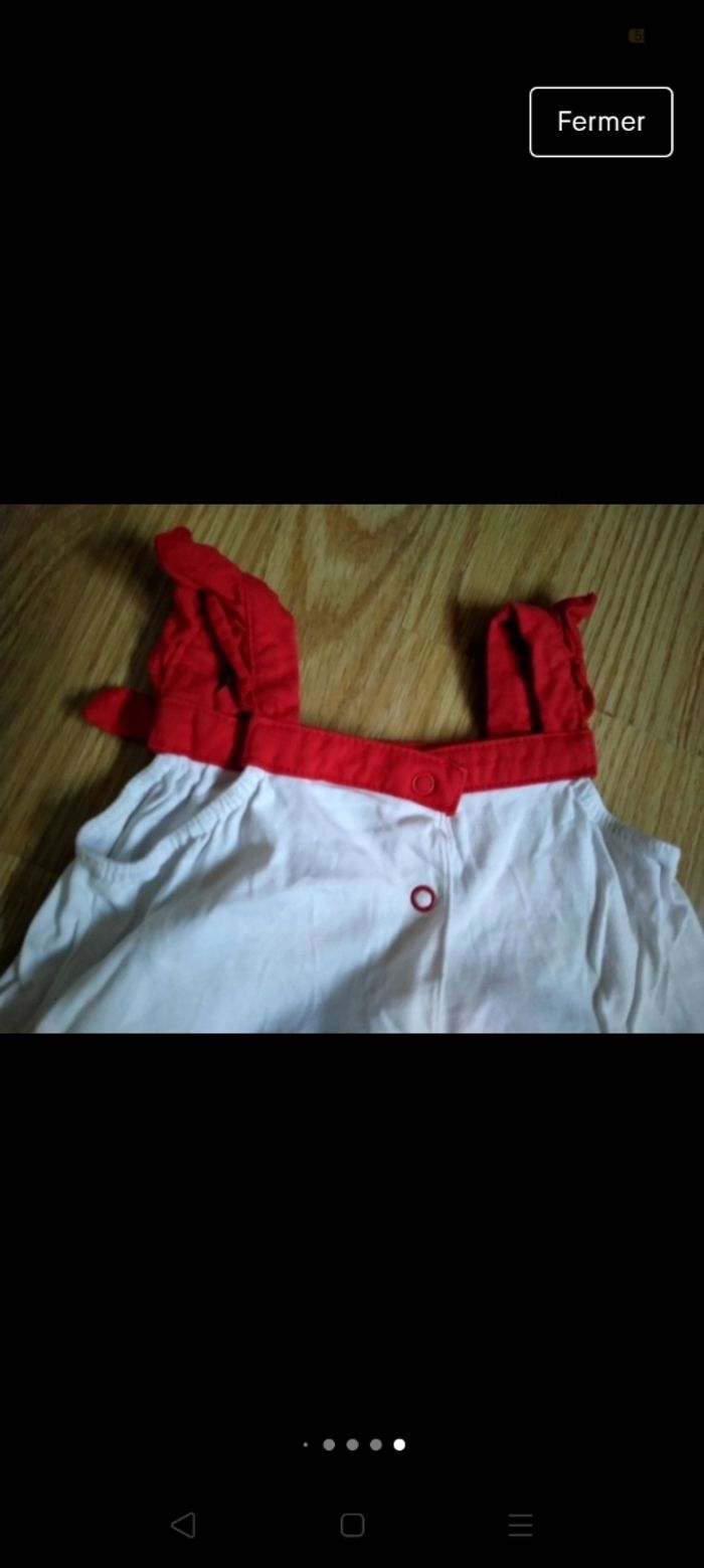 Débardeur blanc bretelles rouges. Disney Baby.
Taille 18 mois - photo numéro 7