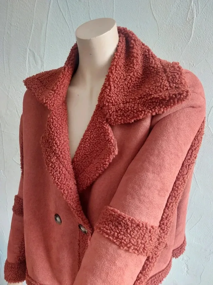 Manteau bouclée orange