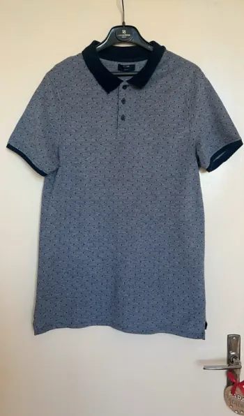 Polo slim à pois Taille L 👕