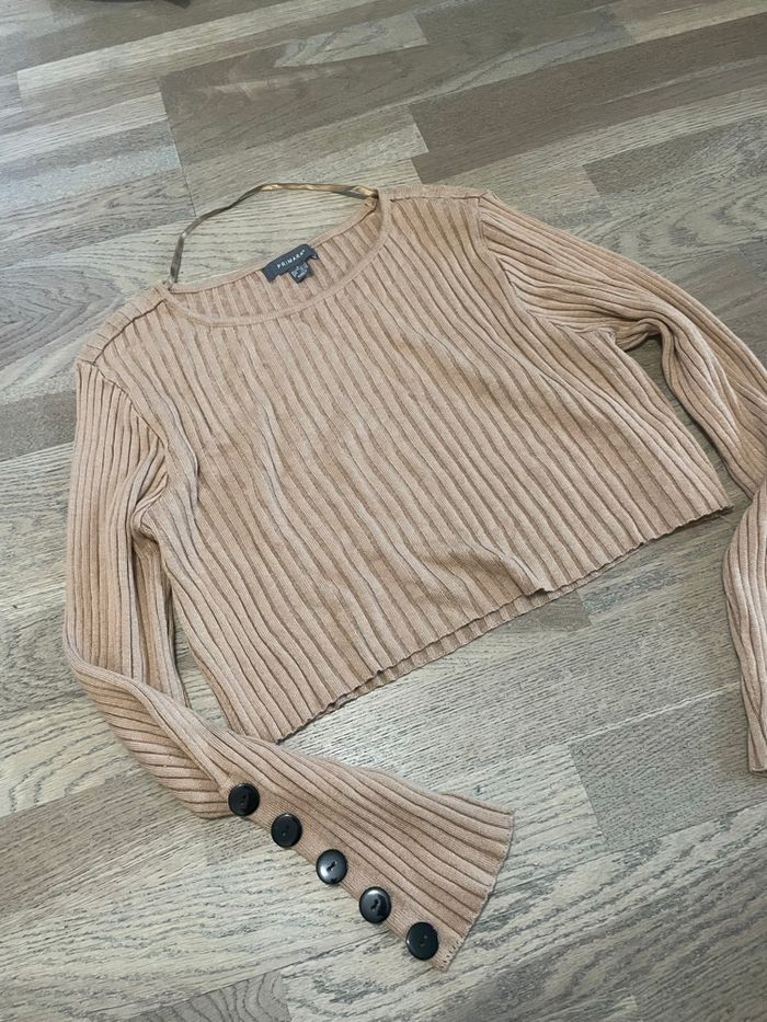 Pull court taille L très bon état