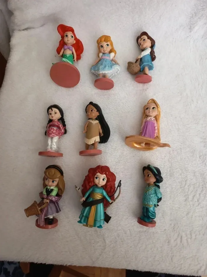 Lot 9 figurines animators Disney store