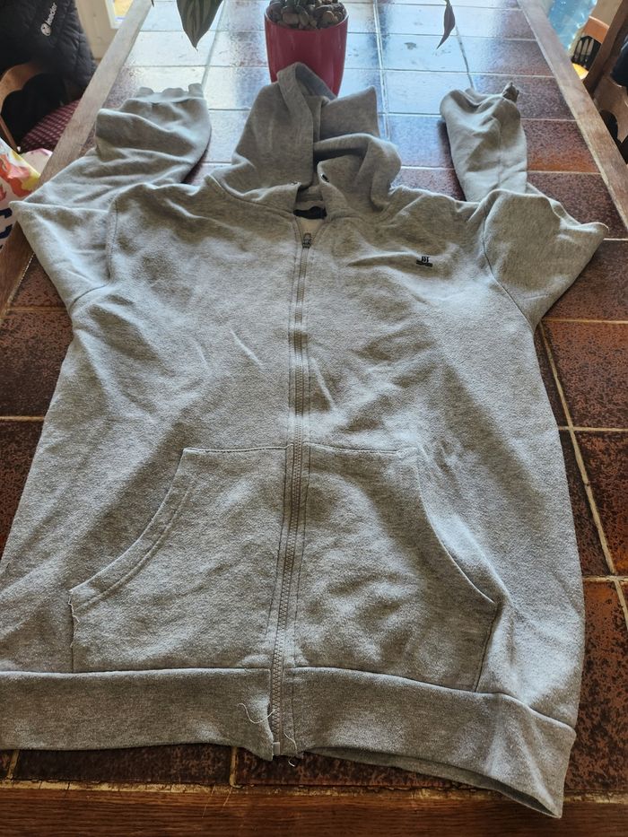 Veste à capuche zippé