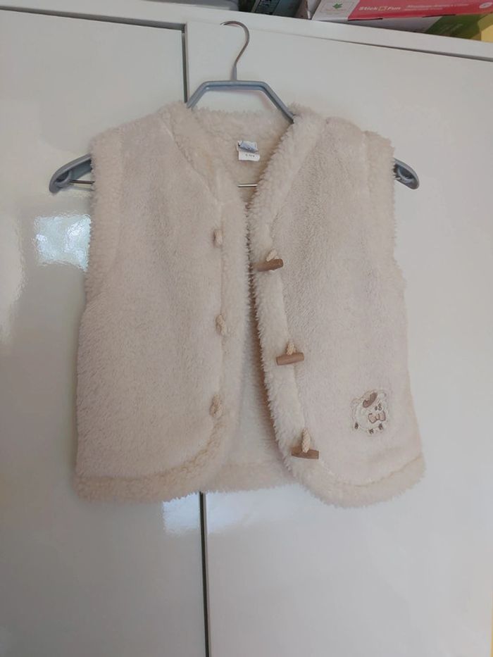 Gilet moumoute sans manches 6A neuf