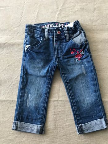 Jeans avec fleurs sur la poche