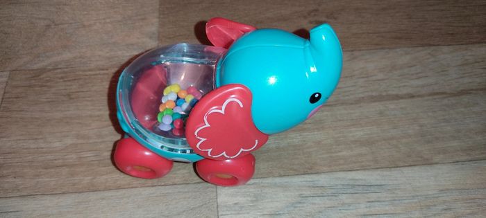 Éléphant à pousser Fisher Price excellent état
