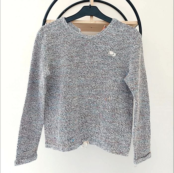 12 ans pull tape a l oeil ( taille plutôt 10 ans)