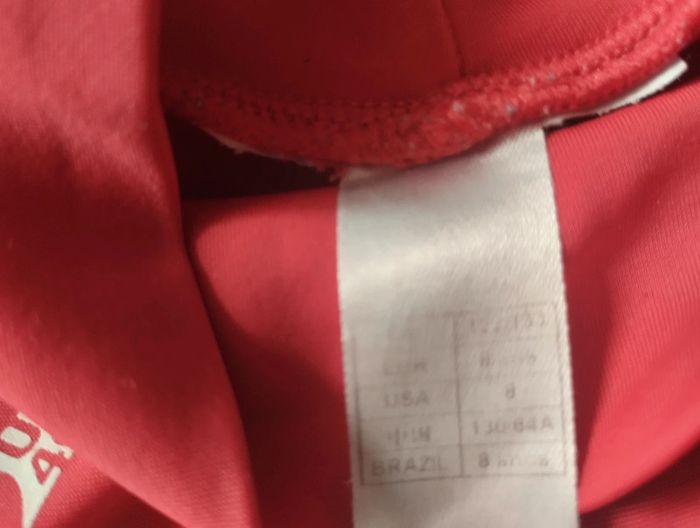 Tee short UV Decathlon 8ans - photo numéro 3