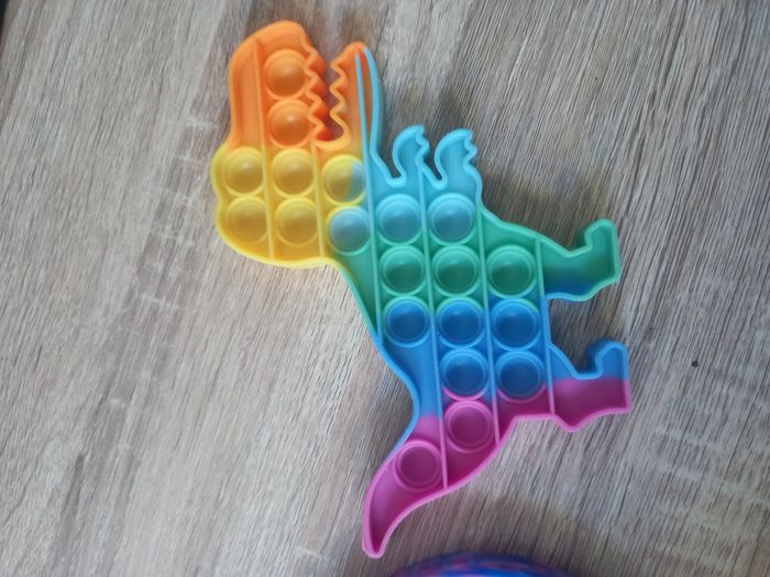 Jeu sensoriel / pop it / jeu anti stress en forme de dinosaure et de rond - photo numéro 8