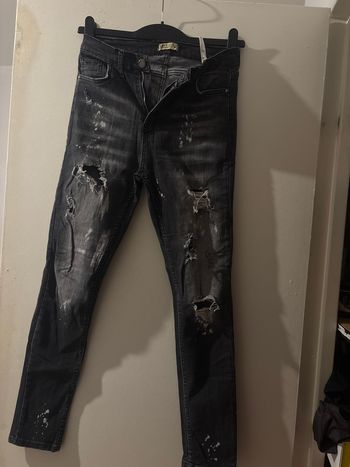 Jeans troué 