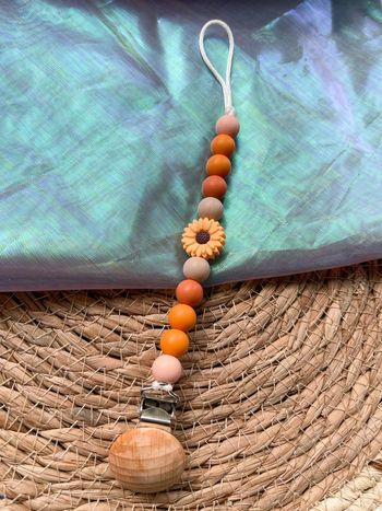 Attache tétine orange pêche beige