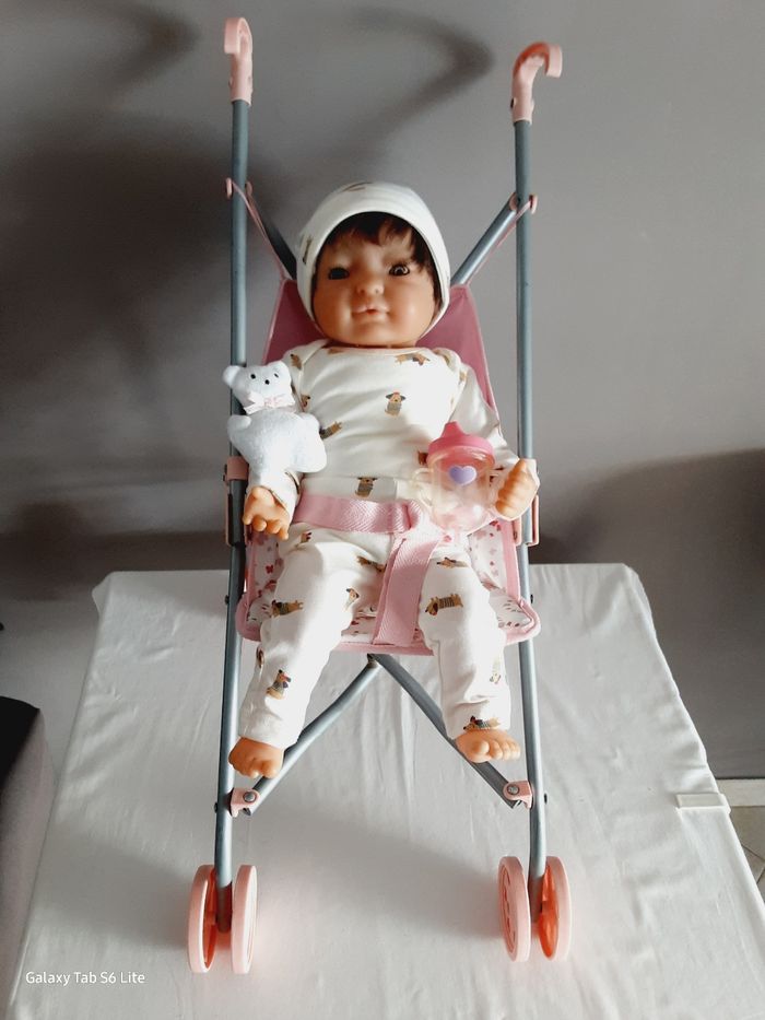 Poupon 50cm avec poucette et accessoires