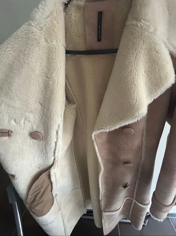 Manteau fausse fourrure très élégant
