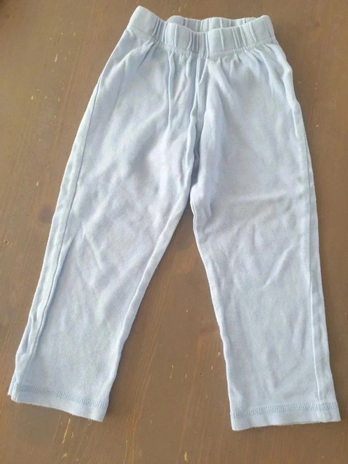 Jogging fille bleu clair 3-4 ans poche arrière façon dentelle Tex