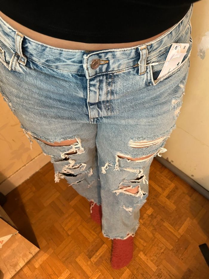 Jeans bleu clair effet déchiré • taille 42 - photo numéro 4