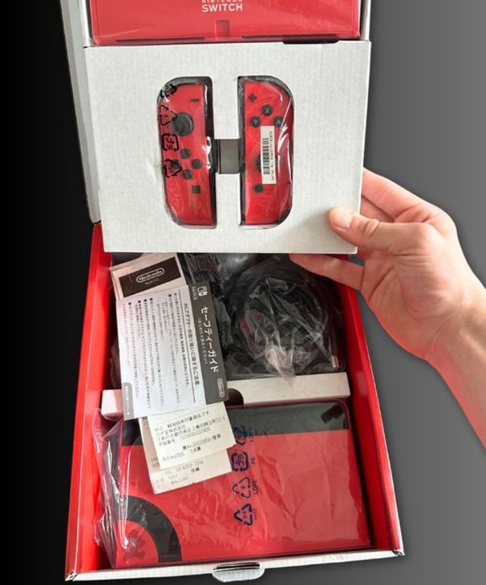 Nintendo Switch oled rouge - photo numéro 7