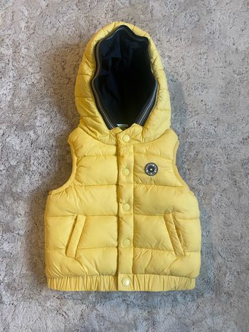 Doudoune sans manche tape à l’œil