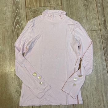 Col roulé rose à cœur