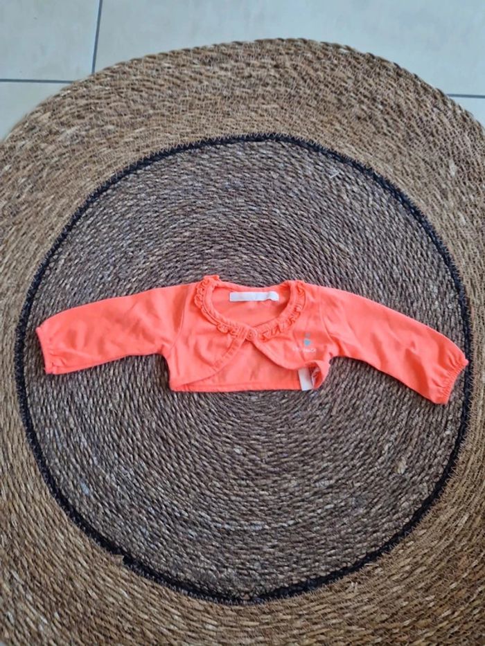 Joli boléro Gémo taille 1 mois