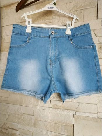 T-shirt fille bleu clair délavé tbe 14 ans