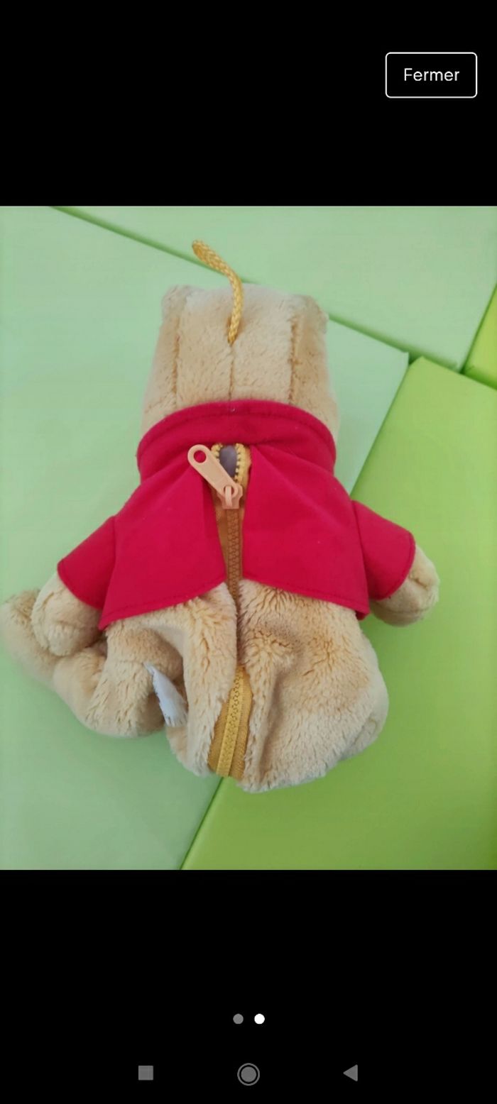 Peluche Winnie avec un zip au dos - photo numéro 2