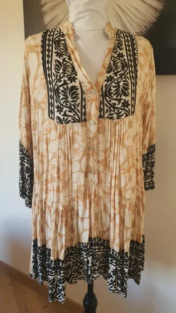 Robe pomponnette