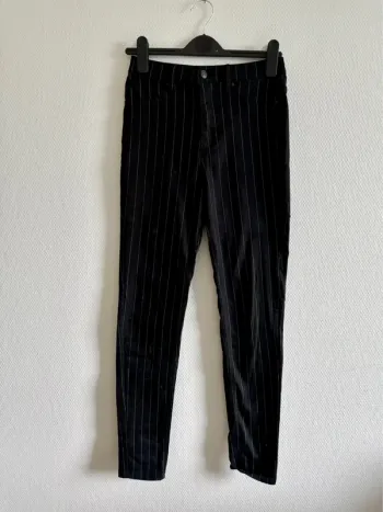Jean noir à rayures blanches - taille 34