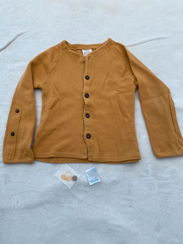 Gilet cardigan manymonths innovateur