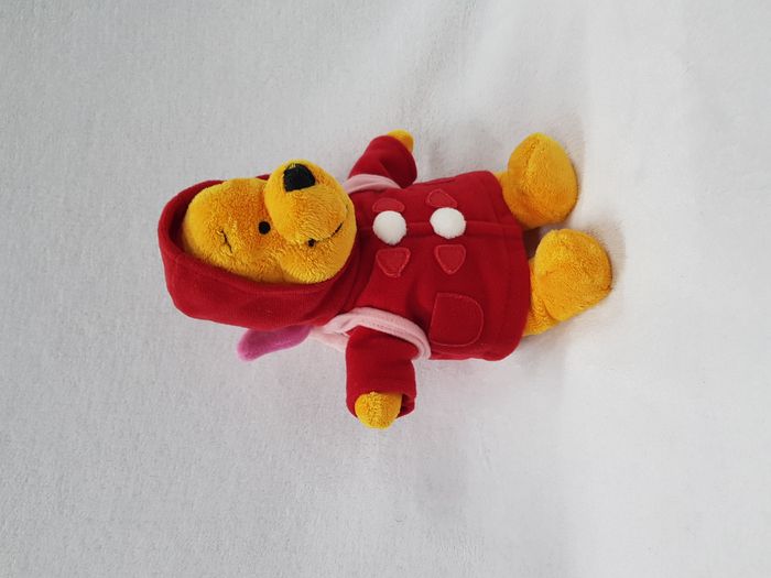 Peluche winnie avec sac à dos porcinet Disneyland