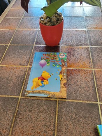 Winnie l'ourson et l arbre a miel