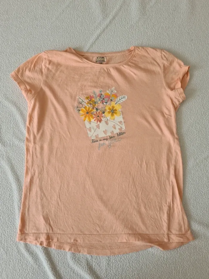 Lot de 13 vêtements (12 t-shirts et 1 legging) - photo numéro 4