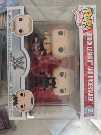 Pop Brock lesnard and Undertaker