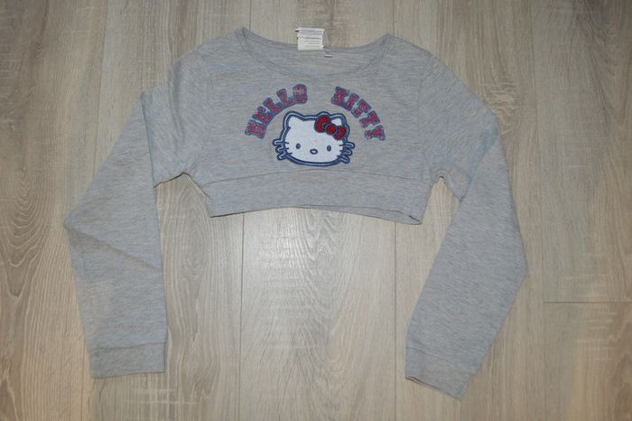 Pull court gris Hello Kitty 8 ans