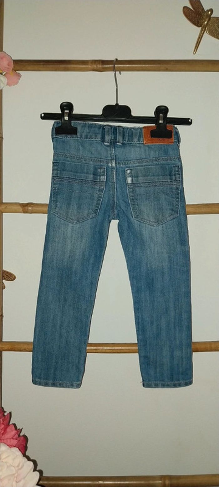 Jean slim Okaidi bleu used effect 2 ans Très bon état - photo numéro 4