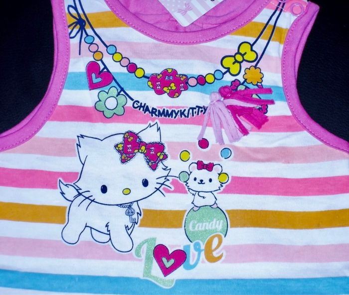 SANRIO - NEW - ROBE BÉBÉ FILLE MOTIF HELLO KITTY À VOLANT, TONS FLASHIES ET DÉTAIL PAILLETTES 6M - photo numéro 4