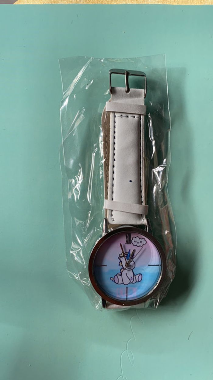 Montre licorne neuve